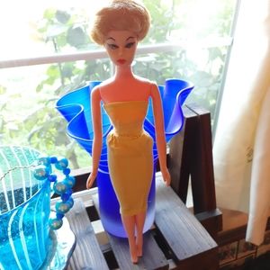 Vintage 1960's imitation Barbie doll with wig.
